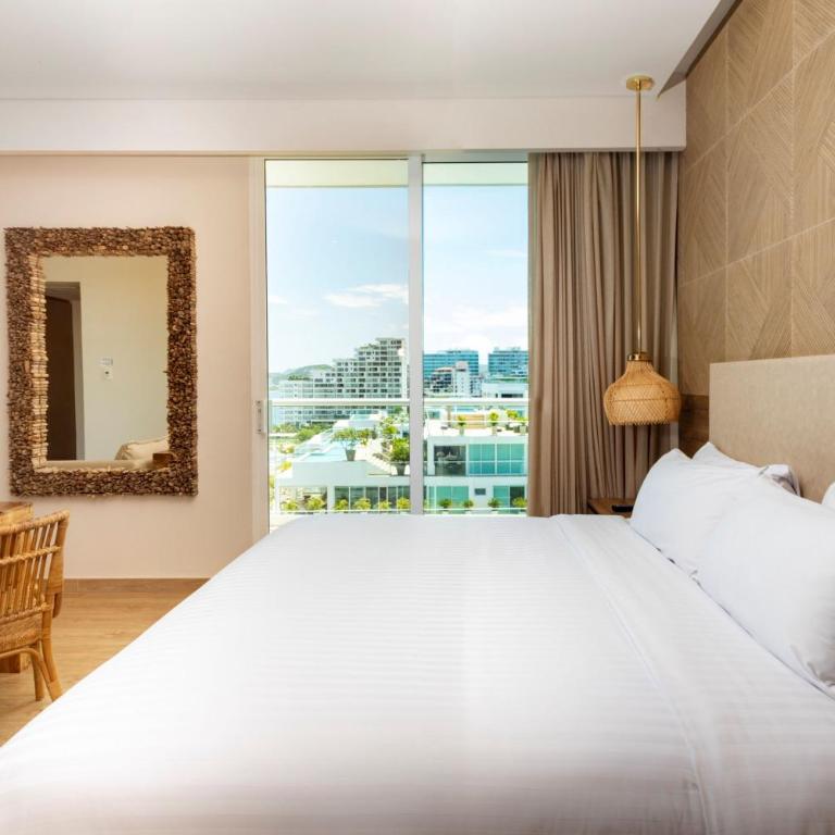 Santa Marta Marriott Resort Playa Dormida - Suite Junior con 1 cama extragrande, sofá cama, balcón y vistas parciales al mar - 6