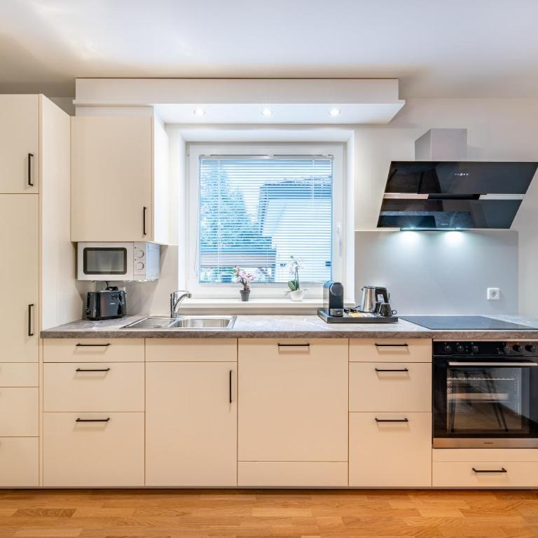 Well-Home Apartments Velden mit Klimaanlage - Deluxe Apartment mit 2 Schlafzimmern und Gartenblick - 5
