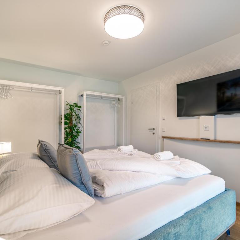 Well-Home Apartments Velden mit Klimaanlage - Deluxe Apartment mit 2 Schlafzimmern und Gartenblick - 7