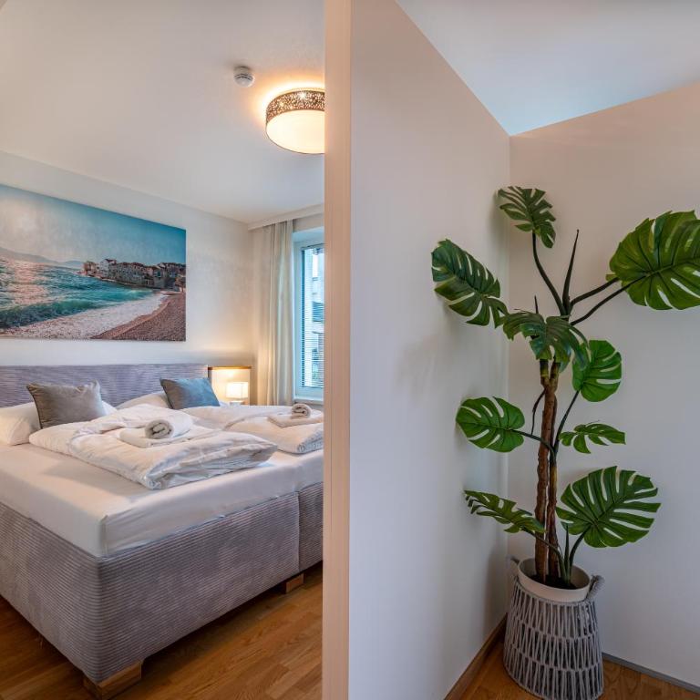 Well-Home Apartments Velden mit Klimaanlage - Deluxe Apartment mit 2 Schlafzimmern und Gartenblick - 12