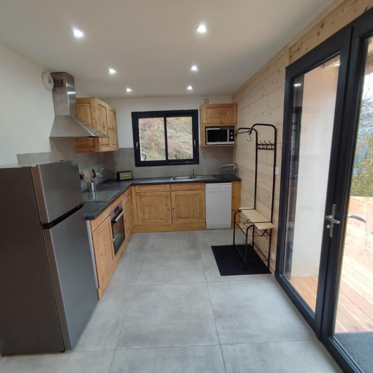 Le Bois Cosy appartement 4 étoiles 6 personnes, ACCES SKI ALPE D'HUEZ GRAND DOMAINE A 3 K M - Appartement 2 Chambres - Vue sur Lac - 33