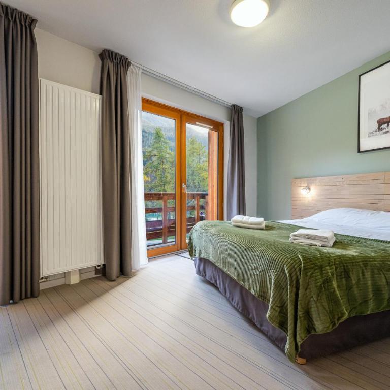 Hôtel et Camping O2 Orcières Outdoor Area - Chambre Quadruple Standard - 2