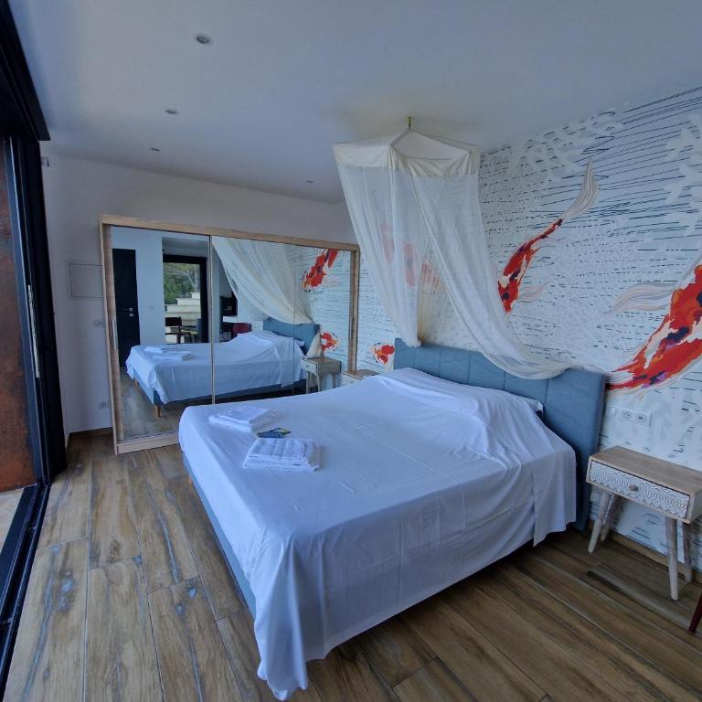 Villa HELIADE -Ile du Levant - Zimmer mit Queensize-Bett und Meerblick - 14