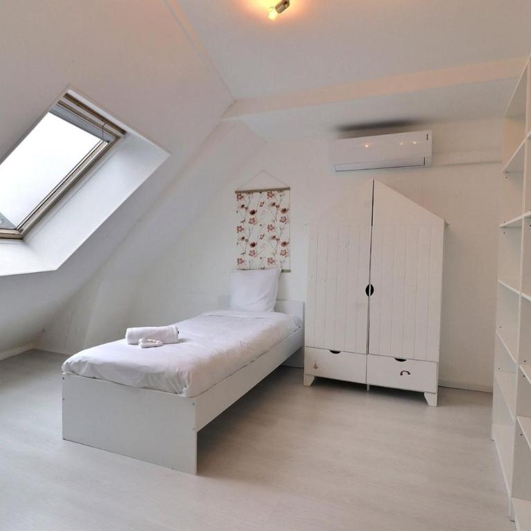 L'oasis urbaine au cœur de la ville - Parking - Mon Groom - Appartement Supérieur - Vue sur Ville - 40