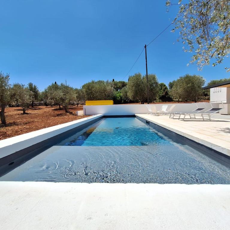 Trulli au milieu d'un champ d'oliviers avec piscine - Villa con 3 Camere da Letto - 25