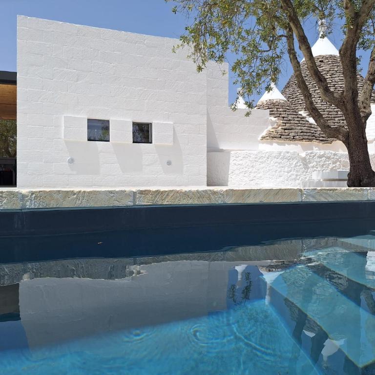 Trulli au milieu d'un champ d'oliviers avec piscine - Villa con 3 Camere da Letto - 26