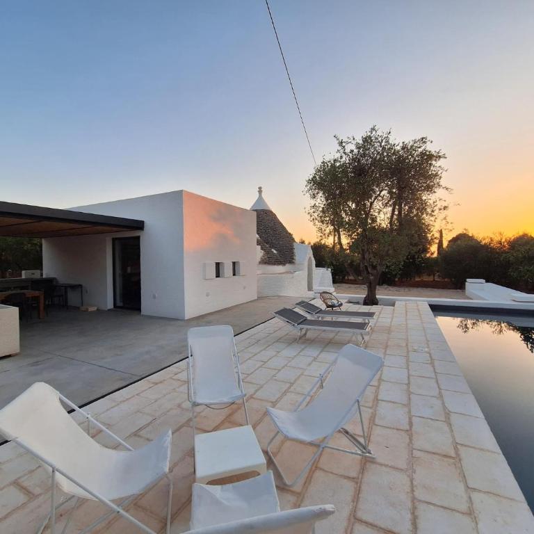 Trulli au milieu d'un champ d'oliviers avec piscine - Villa con 3 Camere da Letto - 27