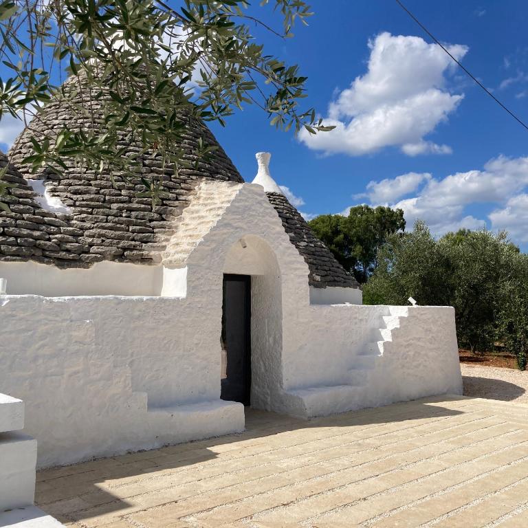 Trulli au milieu d'un champ d'oliviers avec piscine - Villa con 3 Camere da Letto - 31