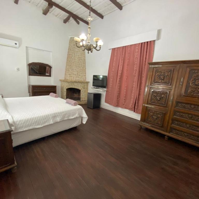 Posada Nocenta Pisetta - Habitación con cama extragrande. - 6