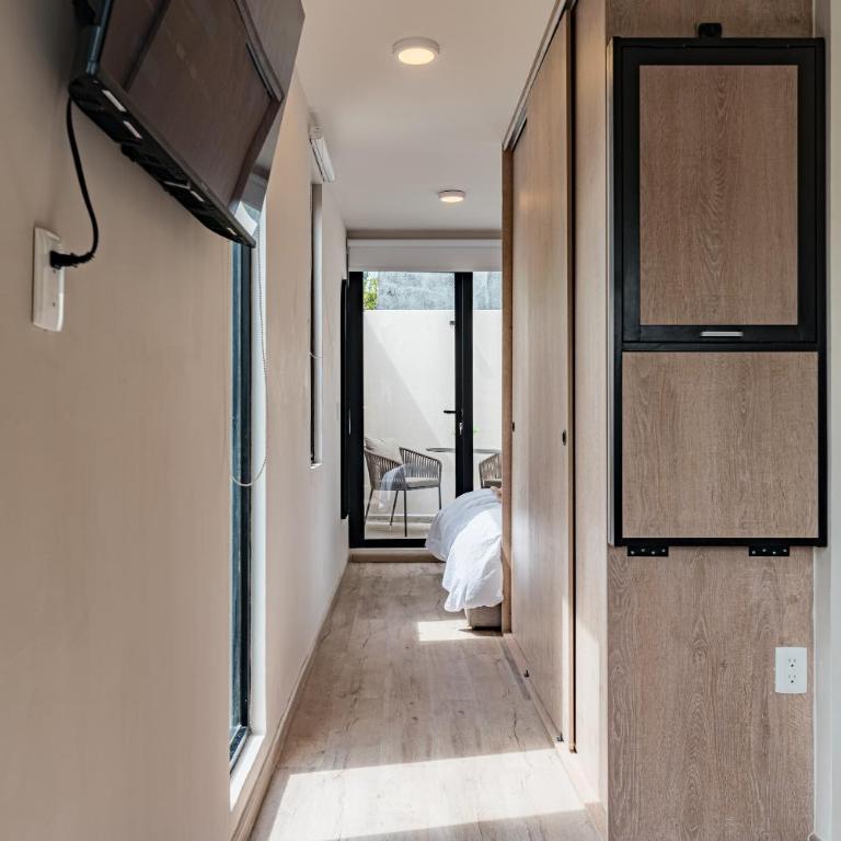 Tiny desk by VH - One-Bedroom Loft Apartment with One Queen Bed - 20