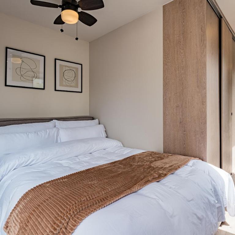 Tiny desk by VH - One-Bedroom Loft Apartment with One Queen Bed - 1