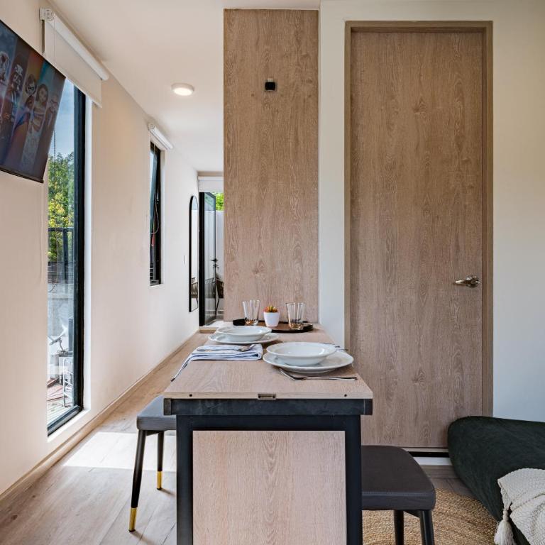 Tiny desk by VH - One-Bedroom Loft Apartment with One Queen Bed - 21