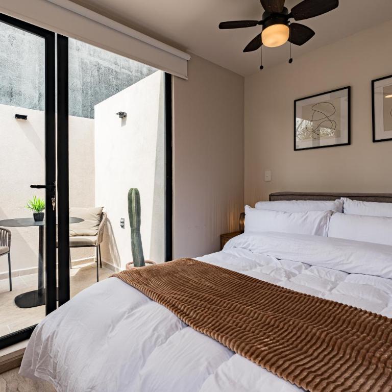 Tiny desk by VH - One-Bedroom Loft Apartment with One Queen Bed - 5