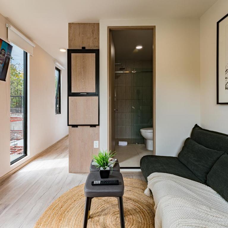 Tiny desk by VH - One-Bedroom Loft Apartment with One Queen Bed - 4