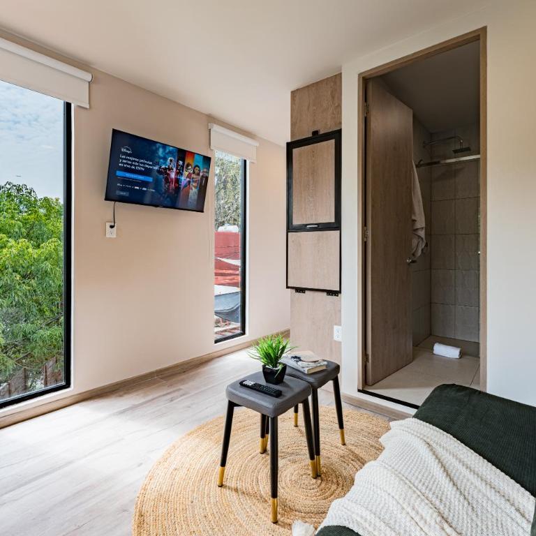 Tiny desk by VH - One-Bedroom Loft Apartment with One Queen Bed - 9