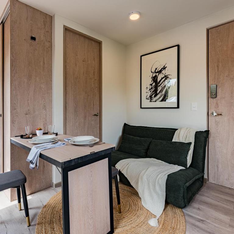 Tiny desk by VH - One-Bedroom Loft Apartment with One Queen Bed - 11