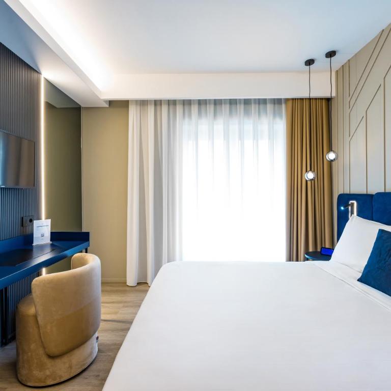 MH SUITES Plebiscito - Camera Matrimoniale Deluxe con Balcone - 4