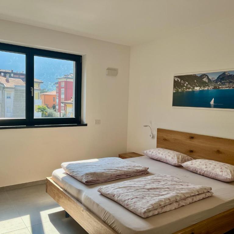 Emma`s Riva-Dream deluxe - sonnige 2-Zimmer-Wohnung mit privatem Parkplatz und Terrasse in Riva del Garda - Appartamento con 1 Camera da Letto - 1