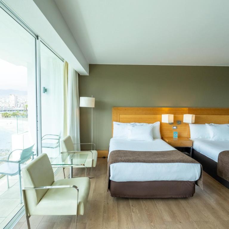 Terrado Suites Antofagasta - Suite Doble con vista al mar - 2 camas grandes - 2
