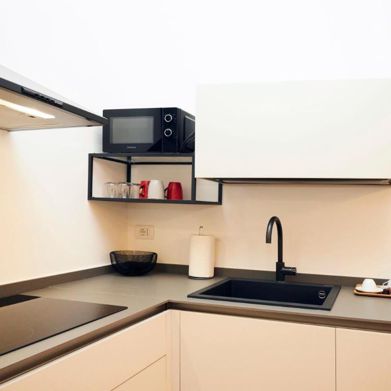 MILANO URBAN FLATS Suite Sanzio 20 - Vicino a Duomo, Stadio e Fiera - Apartment - 12