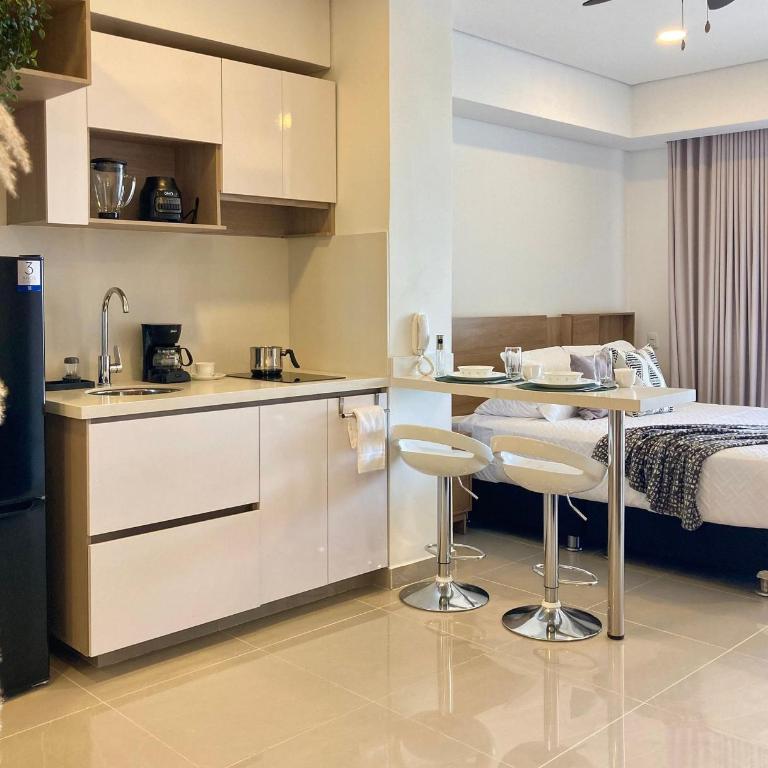 CB1242 Crespo Suite Frente Aeropuerto Vista-Lago - Suite con cama grande - 16