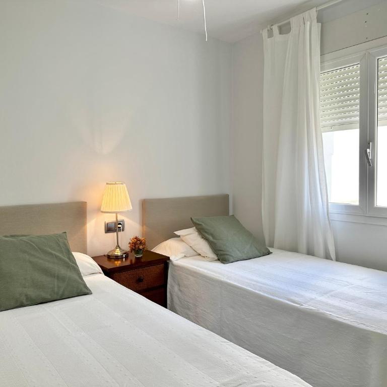 Lunamar beachfront with swimming pool, football, tennis, paddle and basketball courts - EaW Homes - Two-Bedroom Apartment - 4