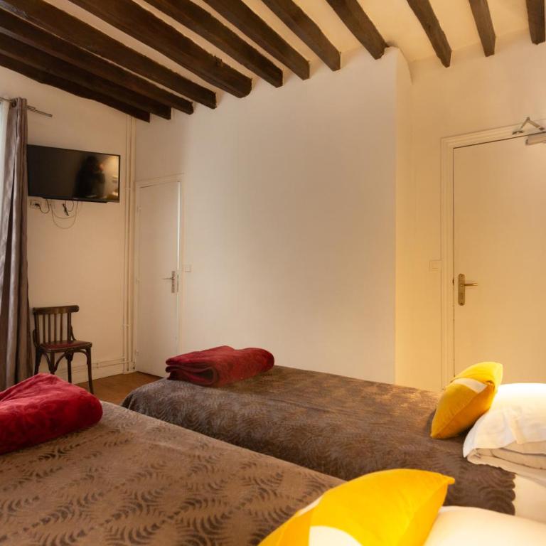 Hôtel Léonard de Vinci II - Chambre Lits Jumeaux - 10