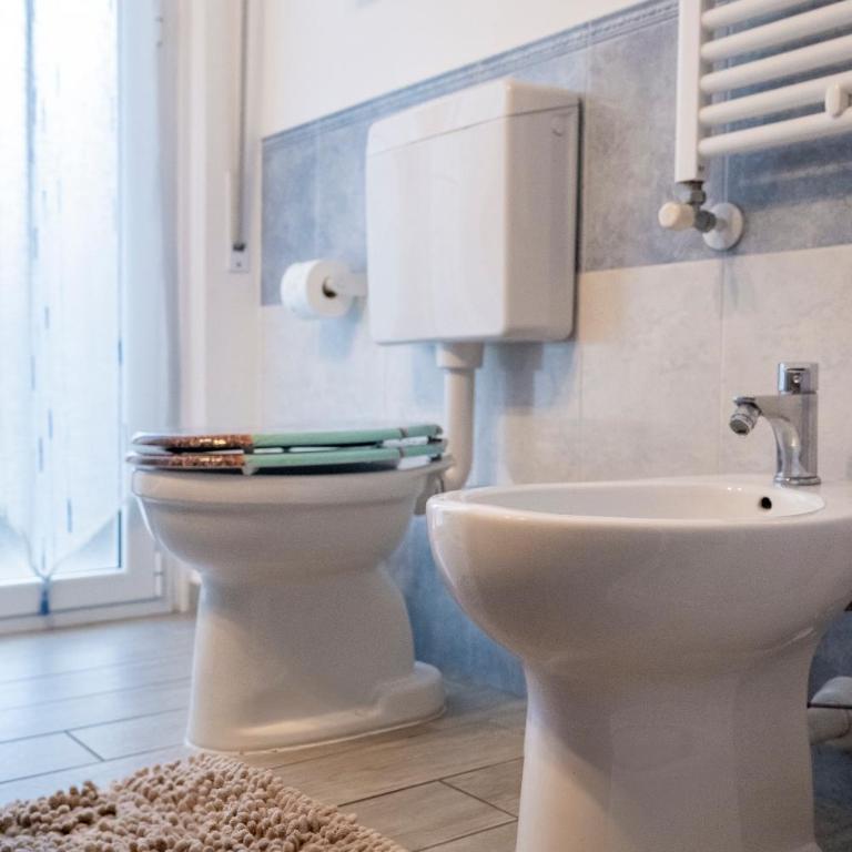 Al numero 6, Trilocale luminoso e accogliente a pochi passi dal mare - Two-Bedroom Apartment - 8