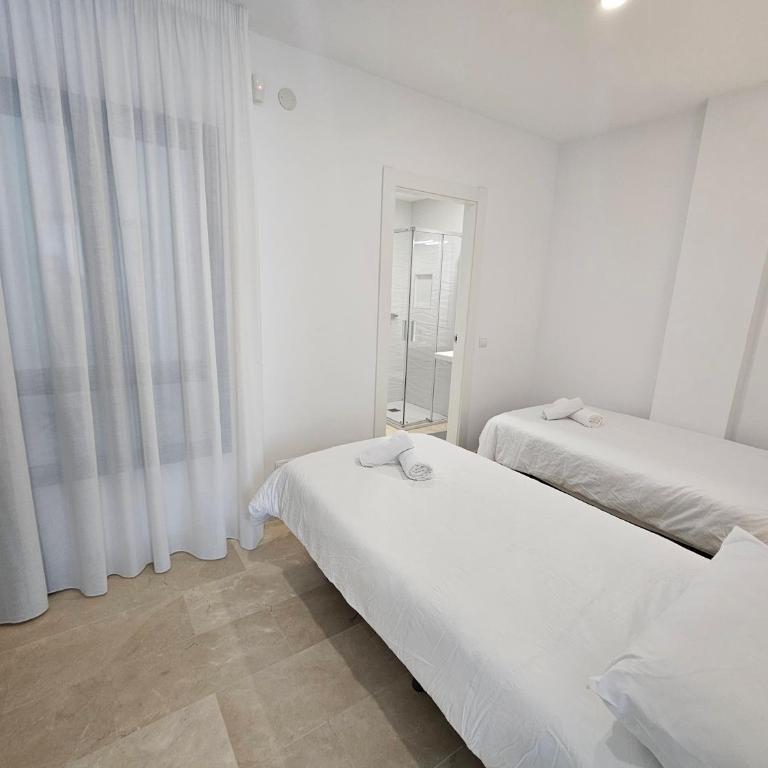 Apartamento 1ª Línea de playa Planta Vistas a Casco Histórico - Apartamento de 2 dormitorios con vistas a la ciudad - 8