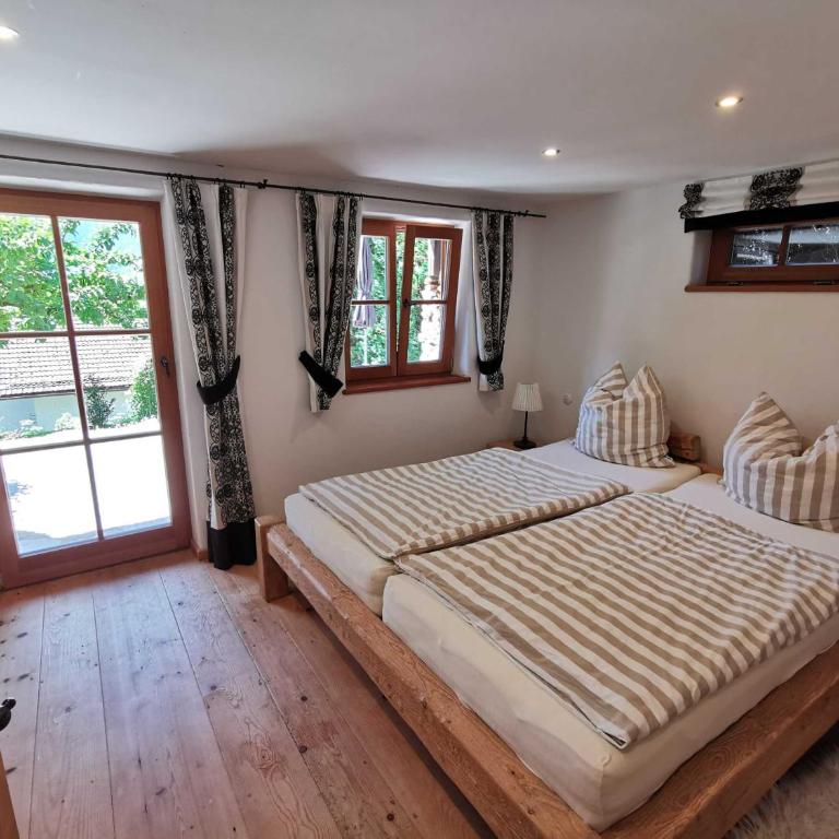 Almhütte Schliersee - Apartment mit 1 Schlafzimmer, einem Balkon und einer Terrasse - 12