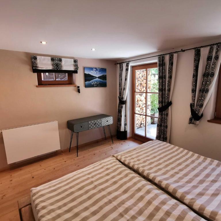 Almhütte Schliersee - Apartment mit 1 Schlafzimmer, einem Balkon und einer Terrasse - 13