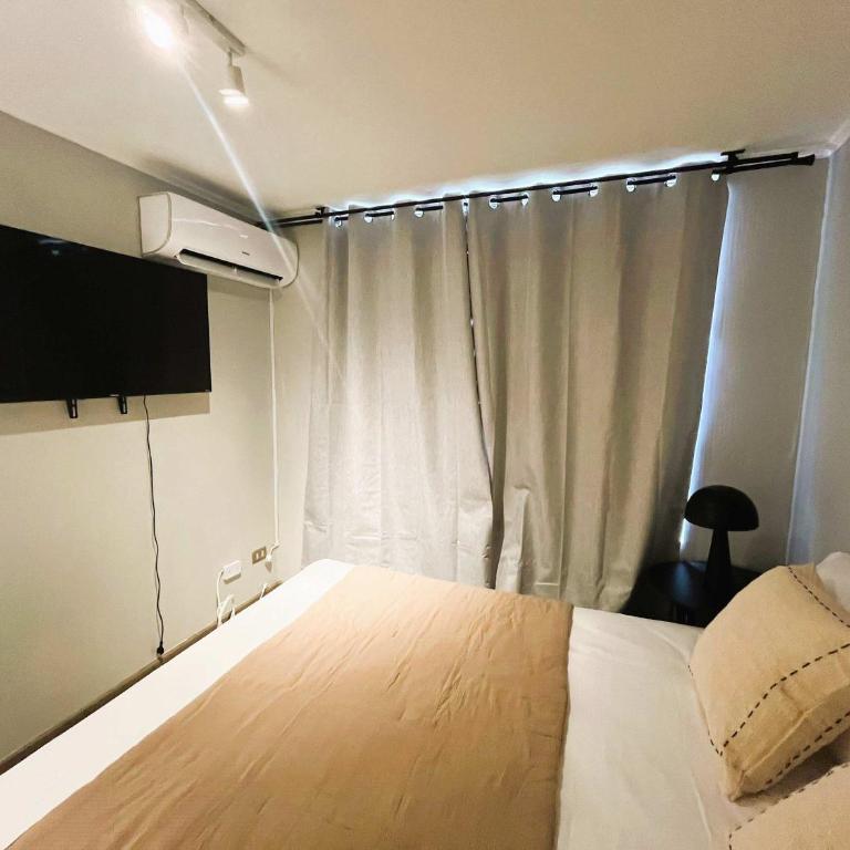 HOM I TOP1 con AA Depto 1D1B en Marcoleta Santiago 7001 - Apartamento - 7