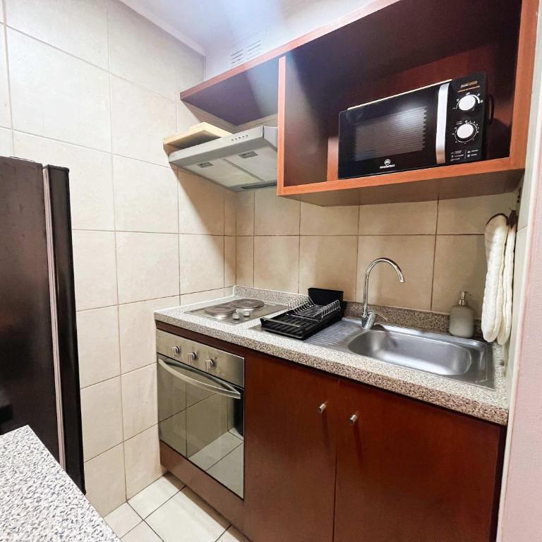 HOM I TOP1 con AA Depto 1D1B en Marcoleta Santiago 7001 - Apartamento - 35
