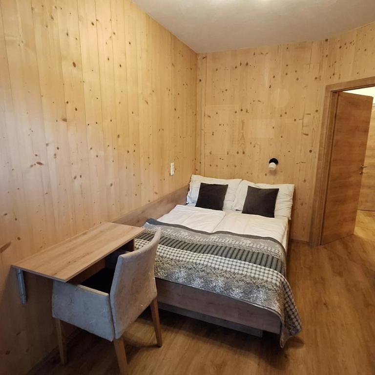Wellness- und Familienhotel Garni Dachsteinresort - Apartment mit 2 Schlafzimmern und Terrasse - 4