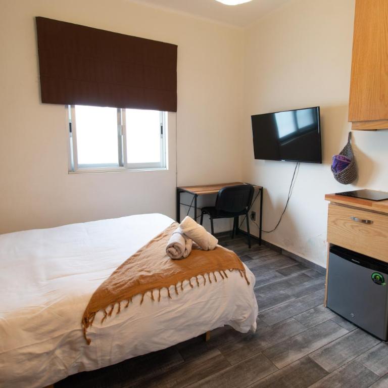 Encantador estudio privado con baño y kitchenette - One-Bedroom Apartment - 10