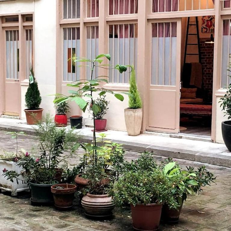 Montmartre Rue des Martyrs Loft with AC, 4-7 PEO - Appartement 3 Chambres - 70