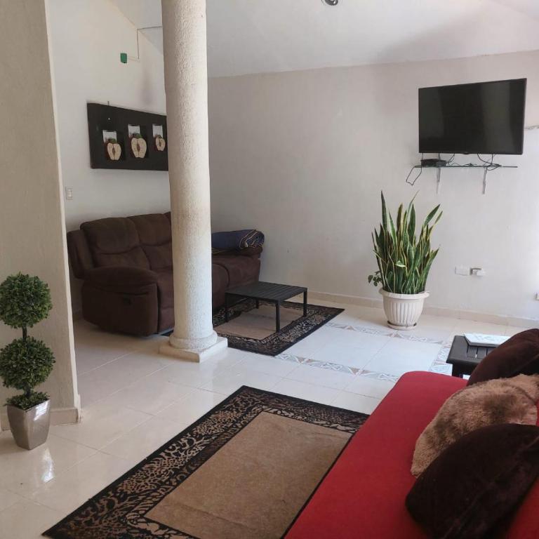 Cozy Mrida Retreat with Pool Garden View - Family Room - 1