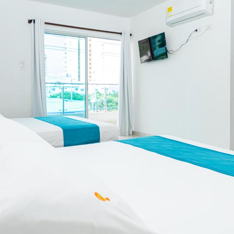 Hotel Aguamarina - Habitación Cuádruple Estándar - 7