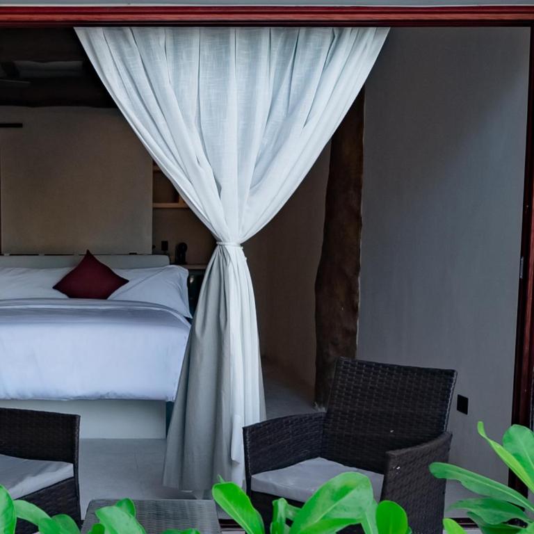 Beachfront Hotel Boutique DK - Suite Junior con vistas a la piscina - 5