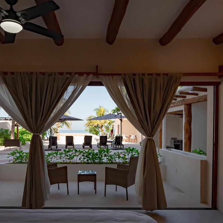 Beachfront Hotel Boutique DK - Suite con vistas a la piscina - 4