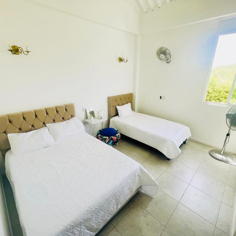 Casa con Piscina privada en Ricaurte cerca a Xielo - Casa de 4 dormitorios - 14