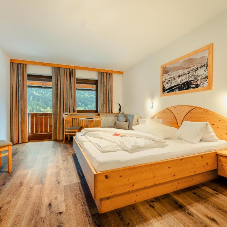 Haus Binter - Dreibettzimmer mit Seeblick - 1