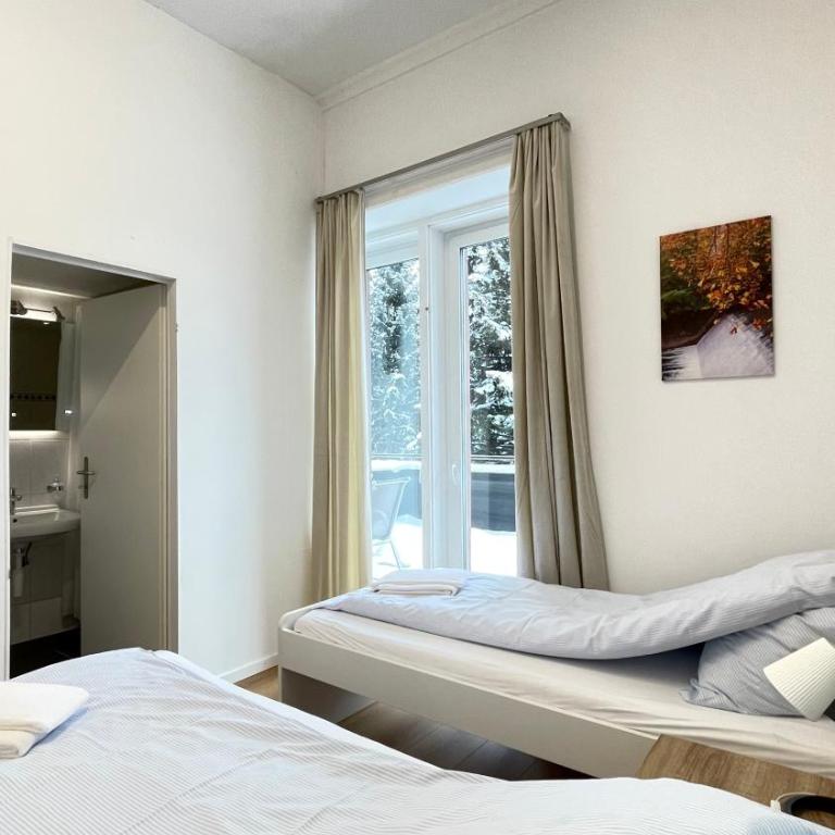 Villa Zentrum Haus Davos - Deluxe Doppelzimmer mit Balkon - 13