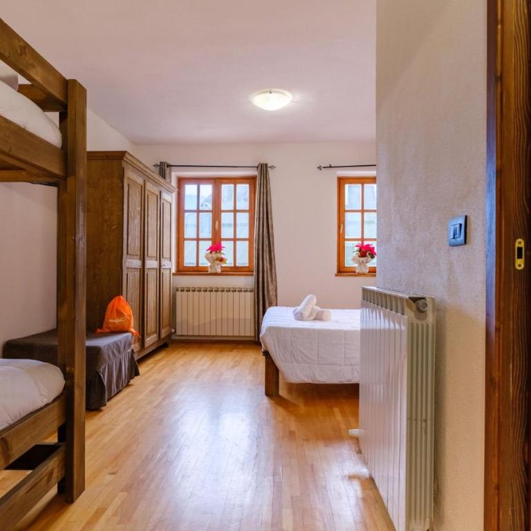 Chalet Le Alpi - Azzurro Club - Camera Quadrupla Comfort - 1