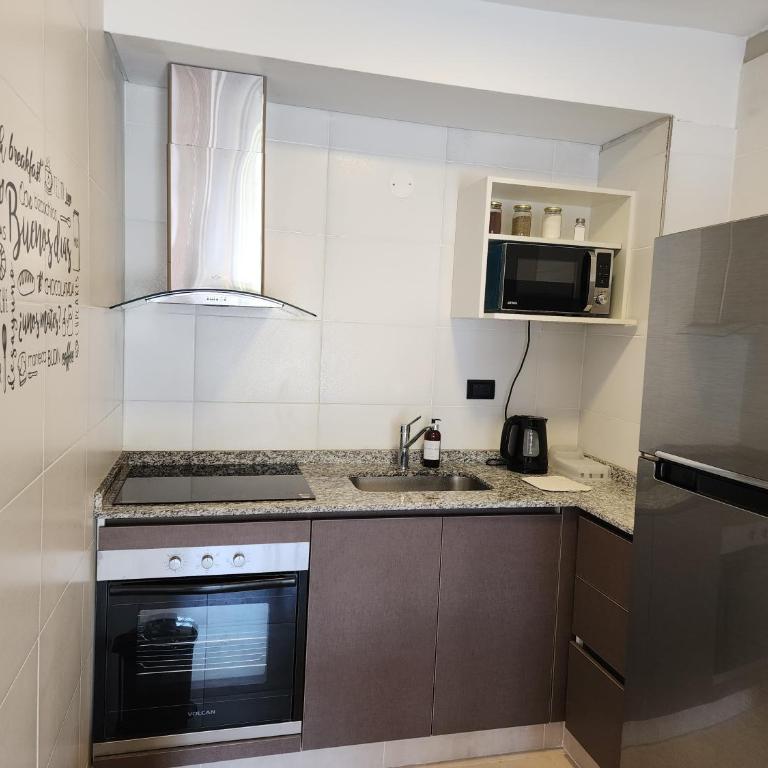 Departamento Emilio Jofré III - Céntrico con estacionamiento y dos baños - Apartamento - 37