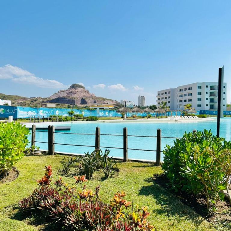 Lindo con gran alberca tipo playa by G P S rentas - Two-Bedroom Apartment - 12