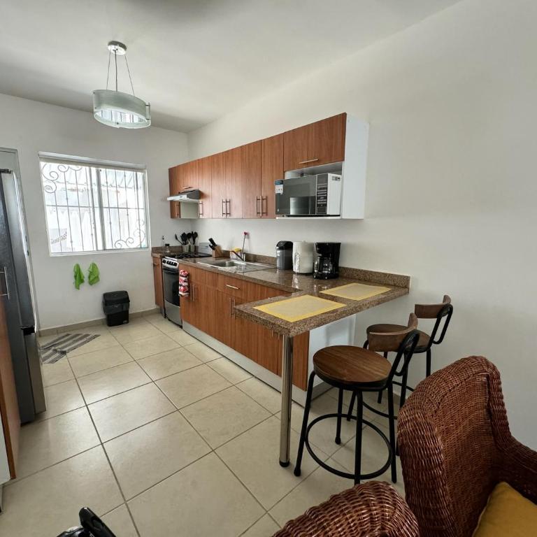 Hermosa y cómoda casa con alberca compartida en Puerto Morelos - Vacation Home - 8