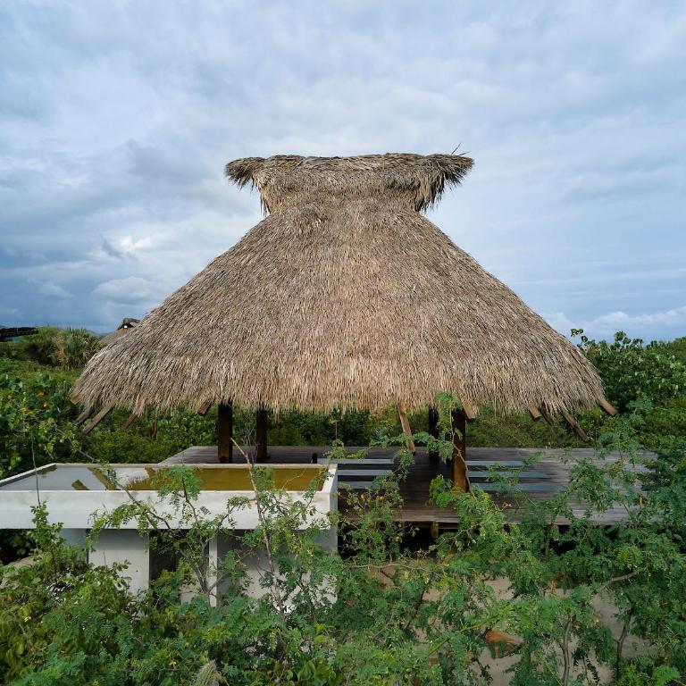 Punta Pajaros Hotel - Habitación con cama grande y vistas al mar - 9