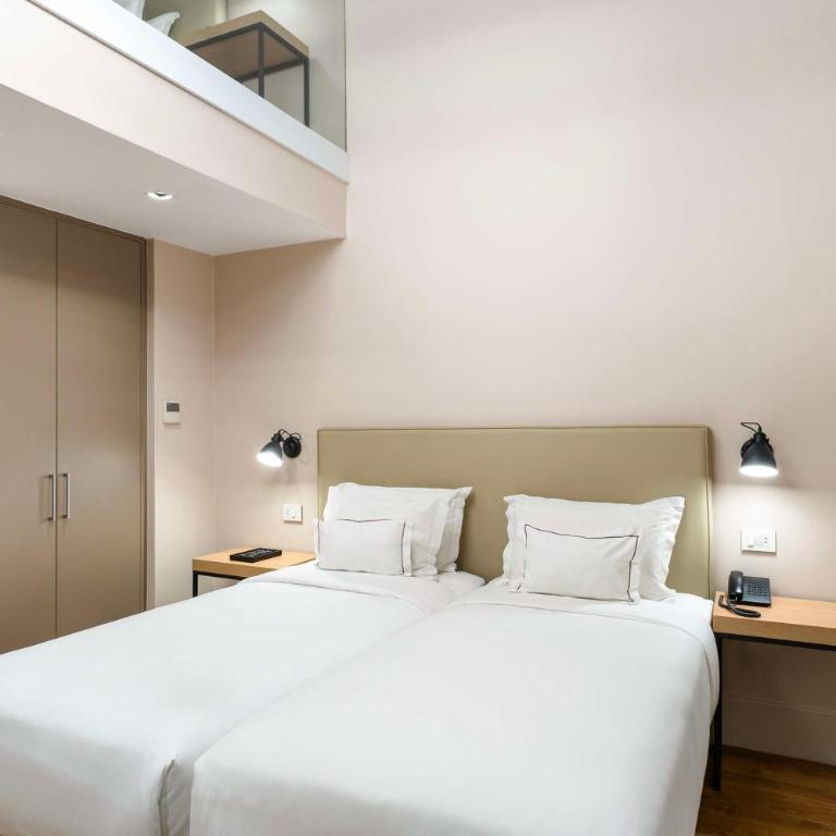 Palmaroga Hotel Asuncion, Tapestry Collection by Hilton - Duplex Family Room with One King Bed and Two Twin Beds - 2