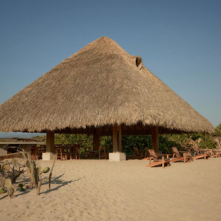 Punta Pajaros Hotel - Habitación con cama grande y vistas al mar - 12
